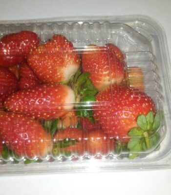 Fresh organic strawberries and strawberry jam
